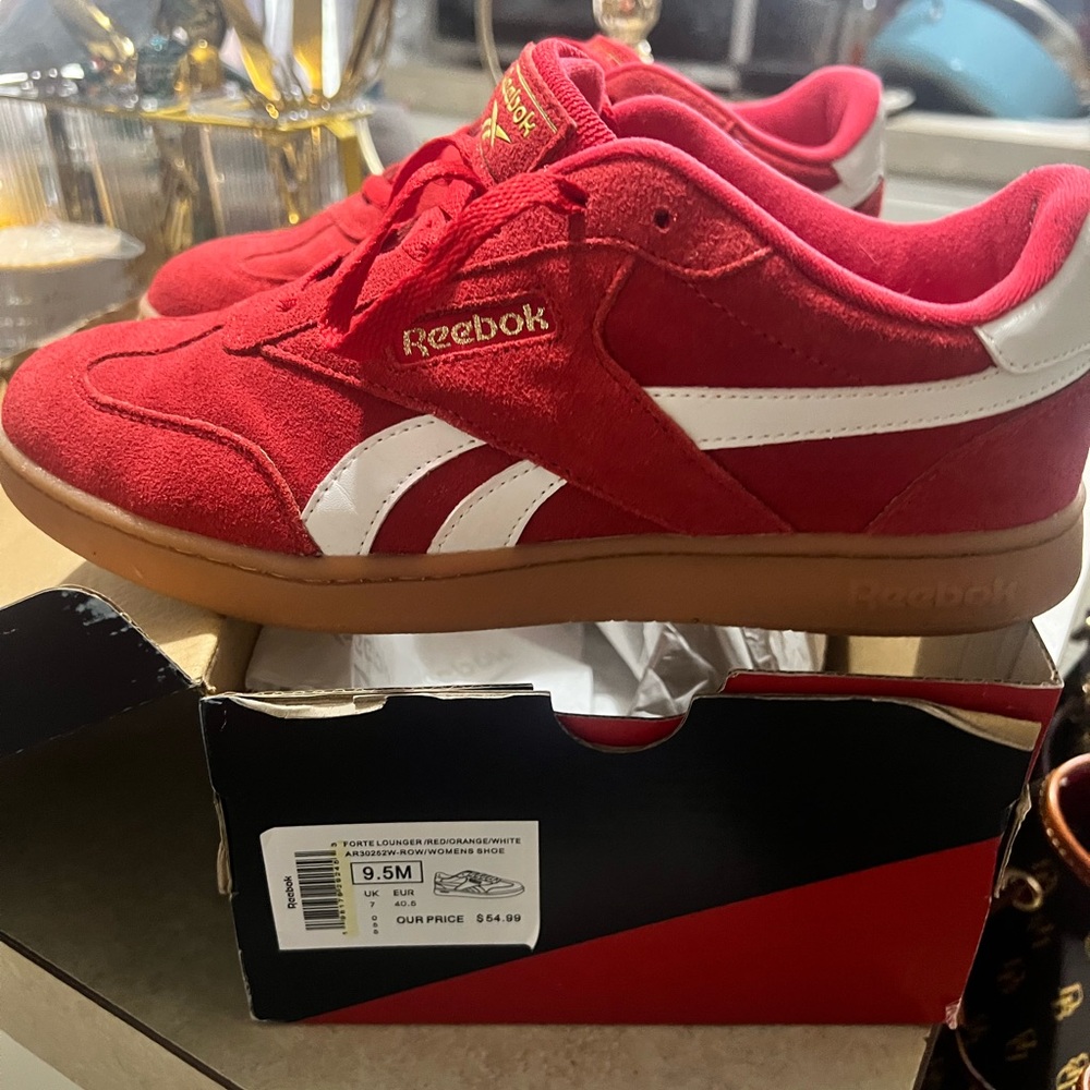 Reebok Women Red and White Adidas sneakers.